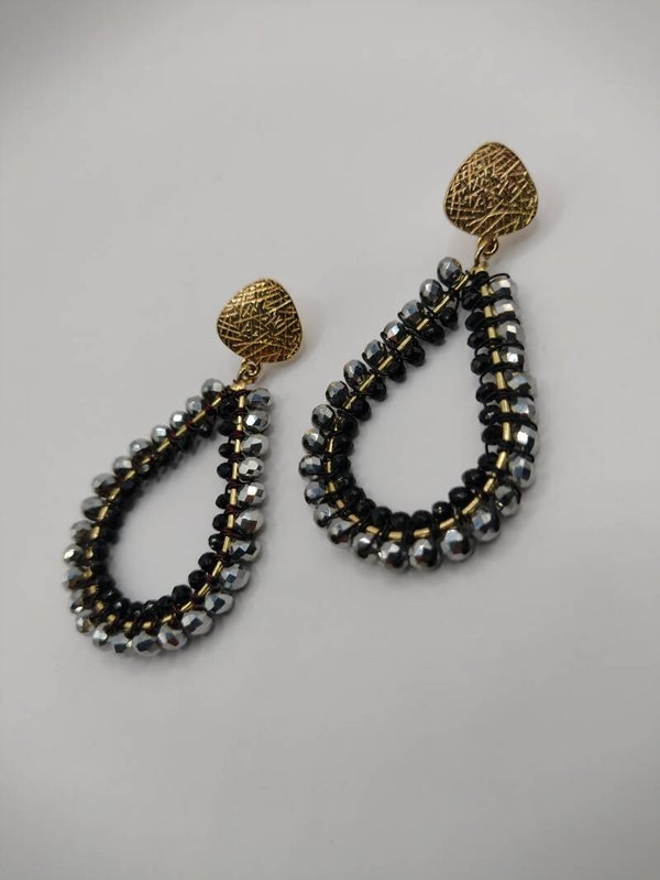 Zwart/gouden druppels