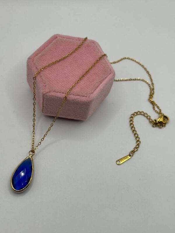 Donkerblauwe druppel glas