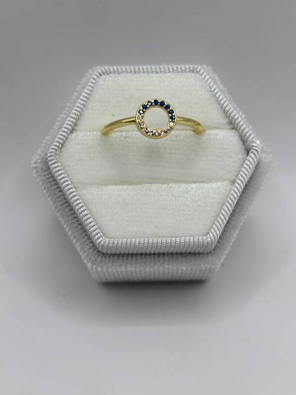 Rondje blauw/doorzichtige steentjes