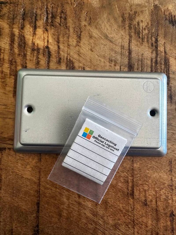 Magnetisch afdekplaatje met logboekje