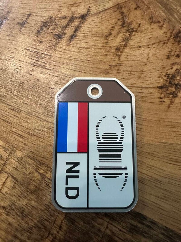 Geocaching Travel Bug® Origins