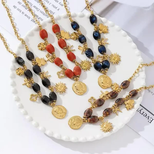 BIBI Ketting met munten en bloemen in 4 kleuren