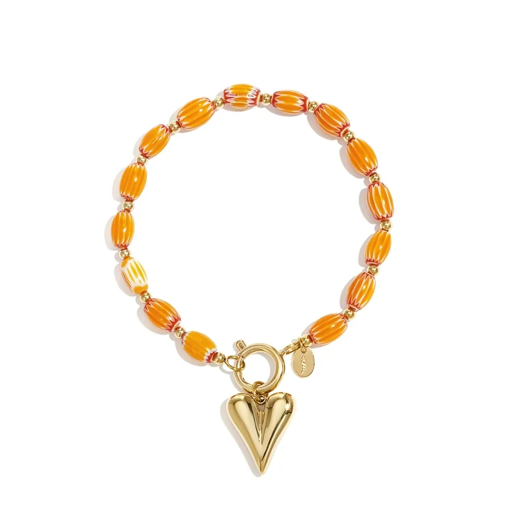 Stainless steel - armband oranje kralen