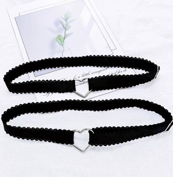 One pair of garters with heart emblem