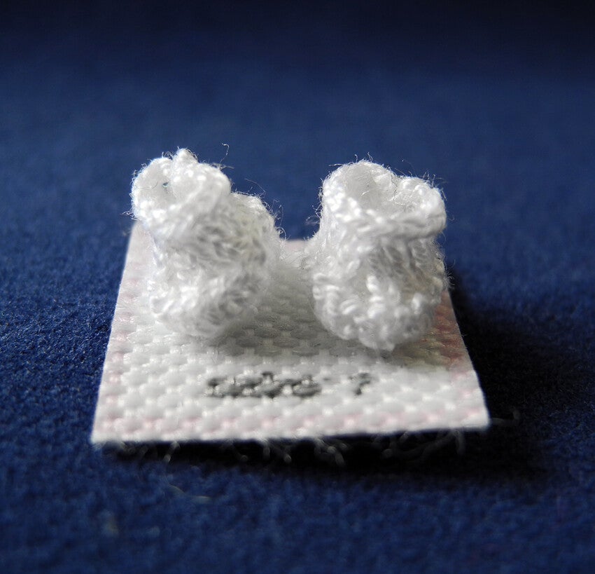 Witte baby slofjes - White baby shoes