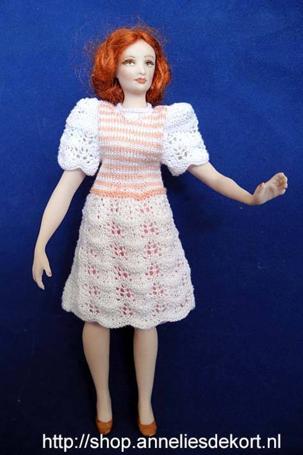 Damesjurk in pauwensteek - Sorry, only in Dutch