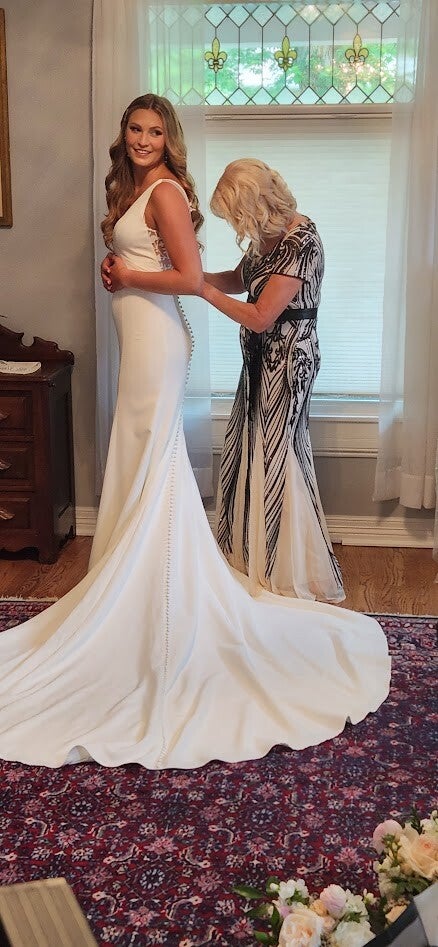 Bride and mother of bride getting ready with loose waves hairstyling in Denver Colorado