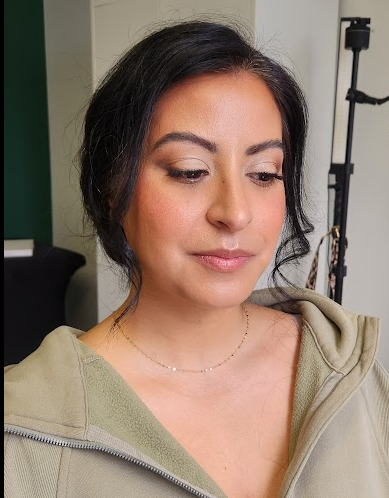 After photo of skin-first bridal makeup with moisturized skin, sheer foundation, and powder for a natural glowing finish.