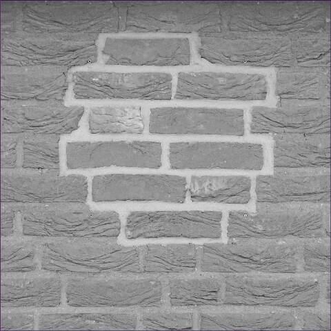 schwarz weiß Fotografie einer Hauswand. Ein weißes Muster bildet sich.