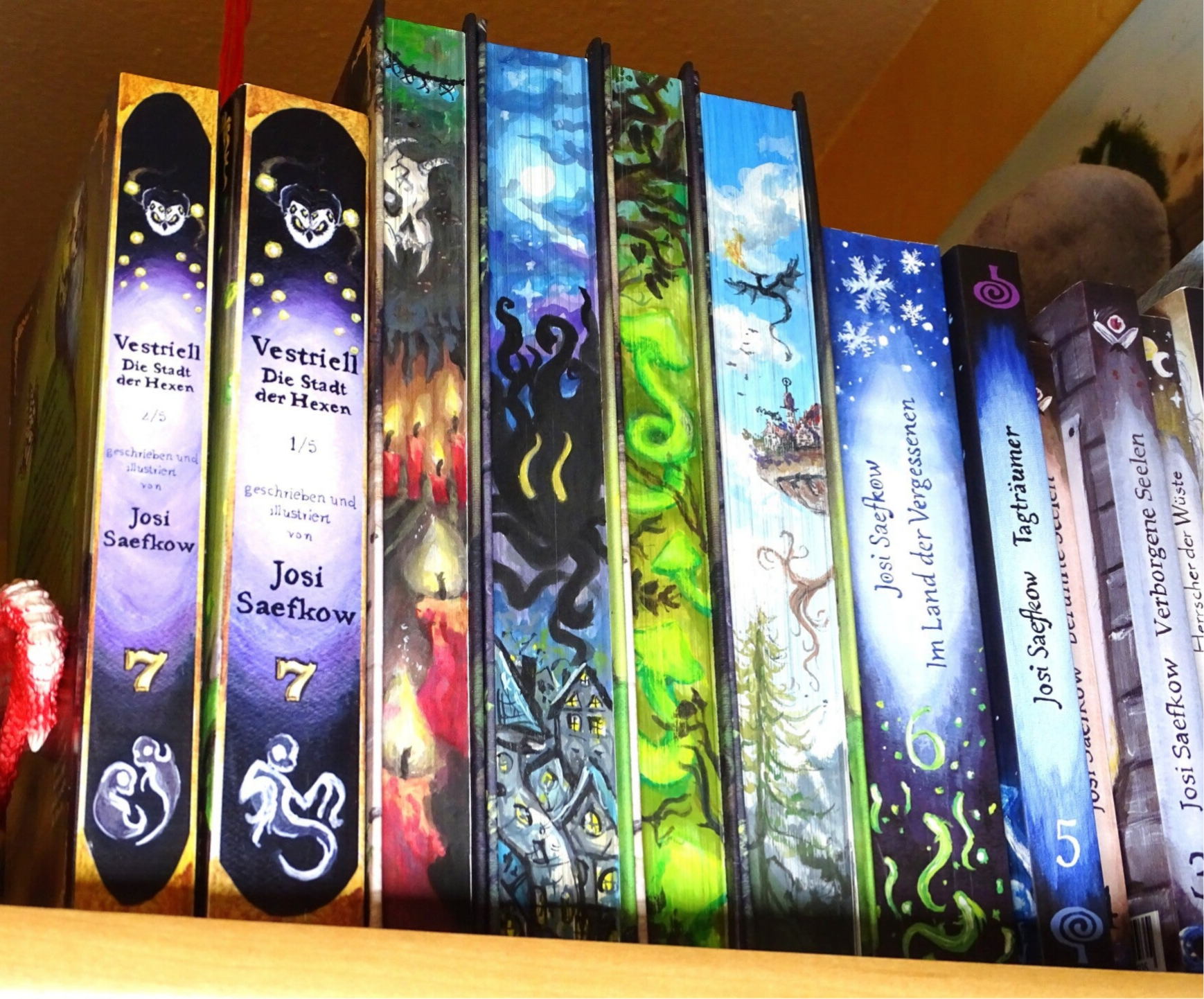 handgemalter farbschnitt, fantasyromane für erwachsene, vestriell saefkow, aquarell farbschnitt handmade gemalt, unikat, einzigartige bücher