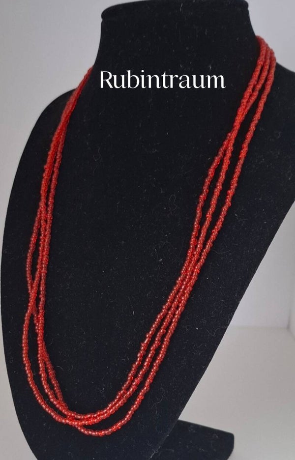 Delicate glass bead necklace in deep wine red, adding a touch of elegance to any outfit.