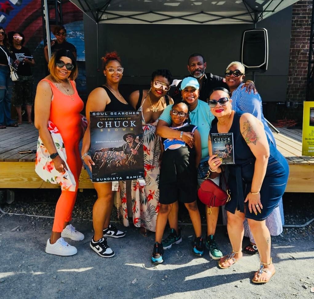 book-signing-with-family-standard-2v1kns.jpg