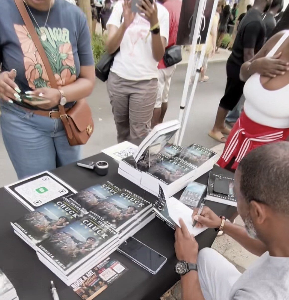 sundiata-signing-books-standard.jpg