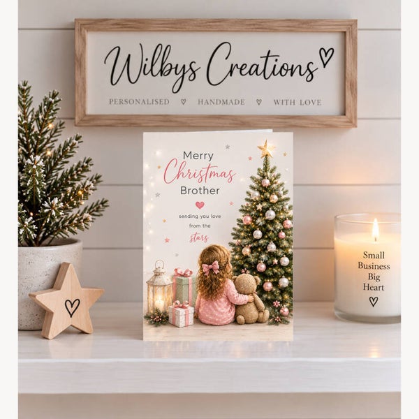 Merry Christmas Brother – Little Girl & Teddy Beside a Christmas Tree with Pink Baubles Card