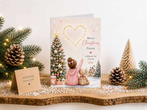 Merry Christmas Nanny Card – Girl and Bunny beneath Heart of Stars
