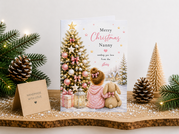 Merry Christmas Nanny Card – Girl and Bunny by Christmas Tree