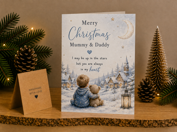 Merry Christmas Mummy & Daddy Card – Boy and Teddy Overlooking Village