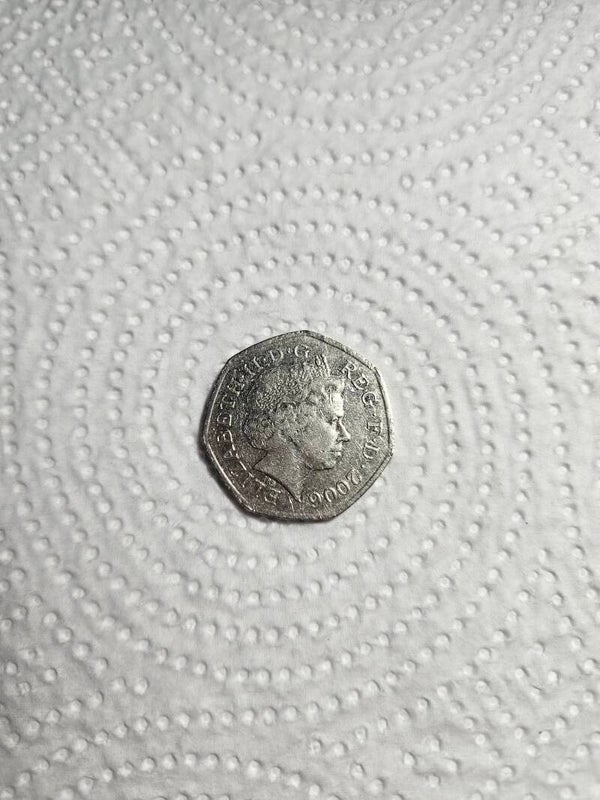 50p 2006 Man carrying Man