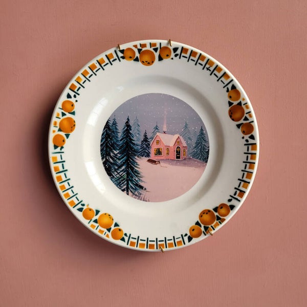 Wandbord roze winterhuisje