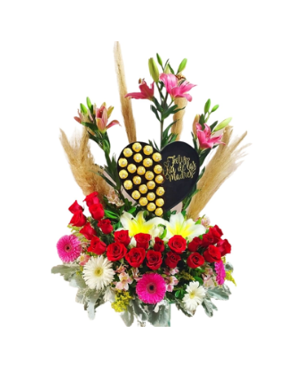 Arreglo con cerrazón al centro de chocolates, rosas y lilis + toque de gerberas