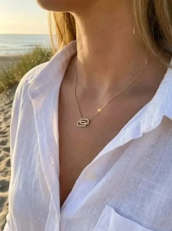 Double Lyra ketting goud