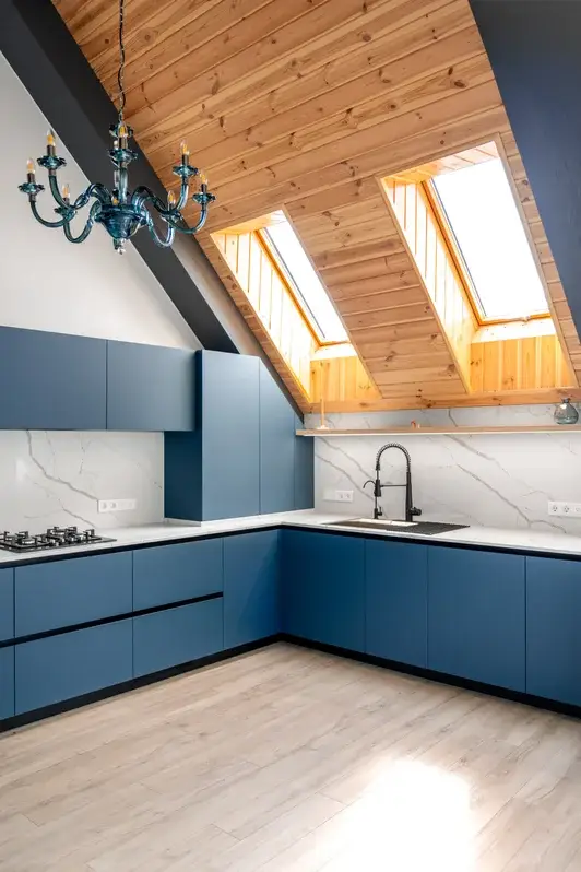 attic-kitchen-wooden-ceiling-modern-blue-fronts-high-standard-xezlu9.webp