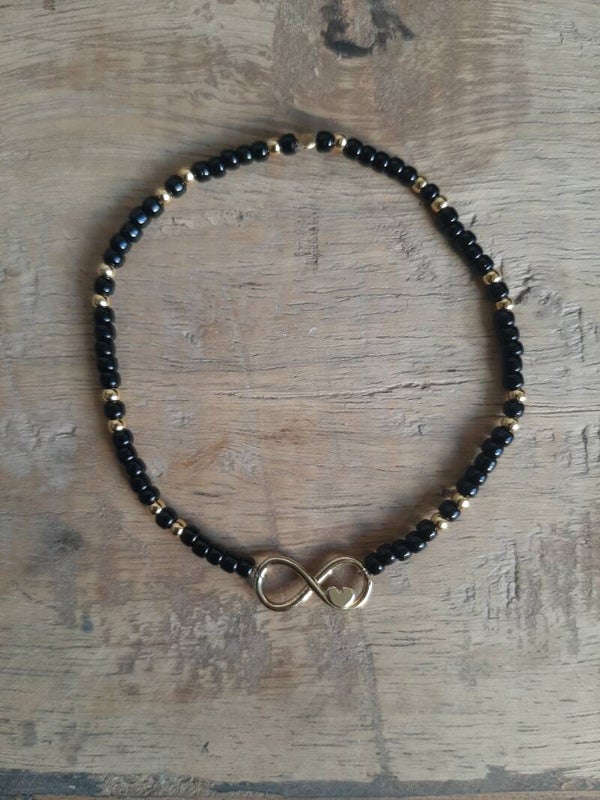 Armband infiniti goud/zwart