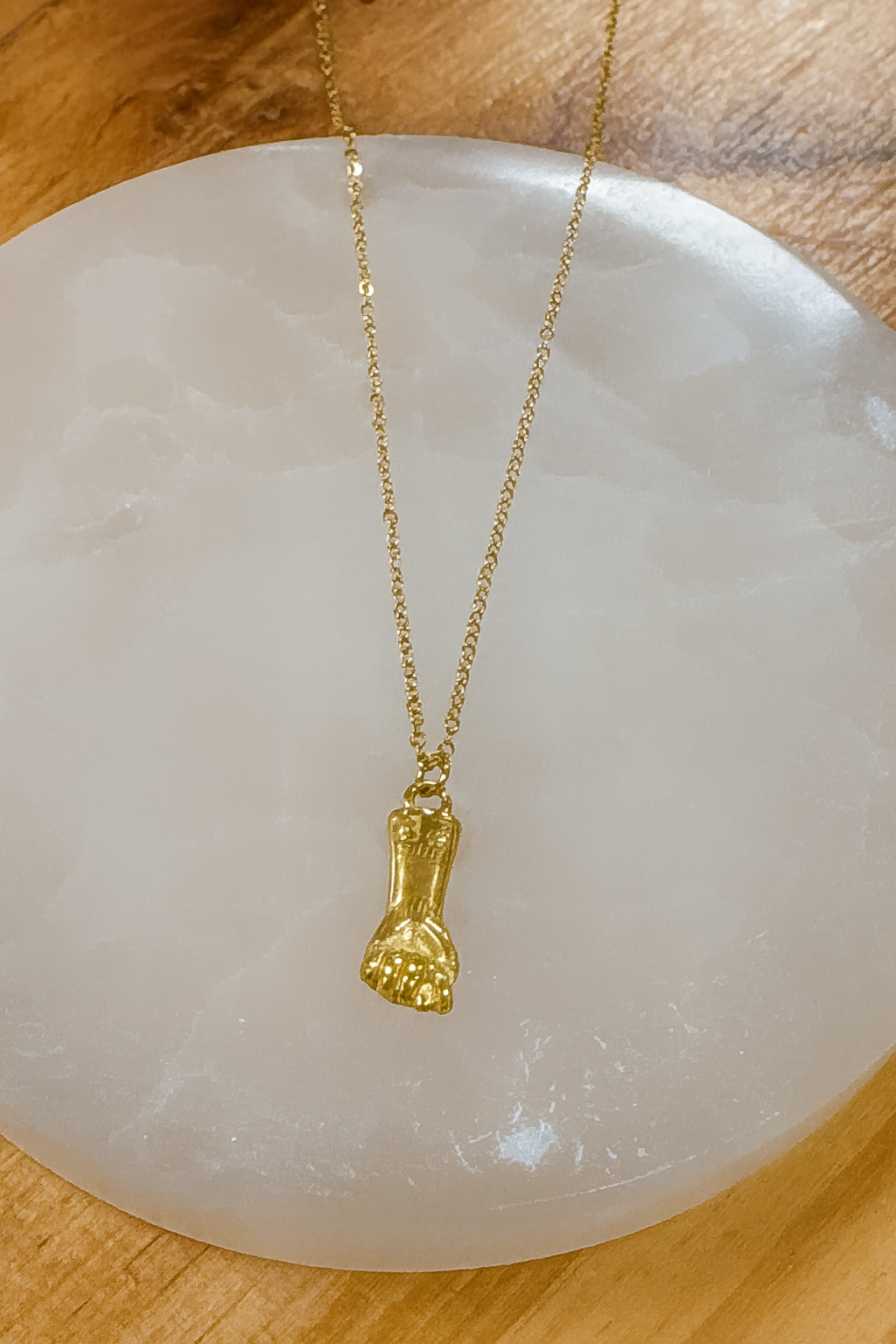 Collar puño protector dorado