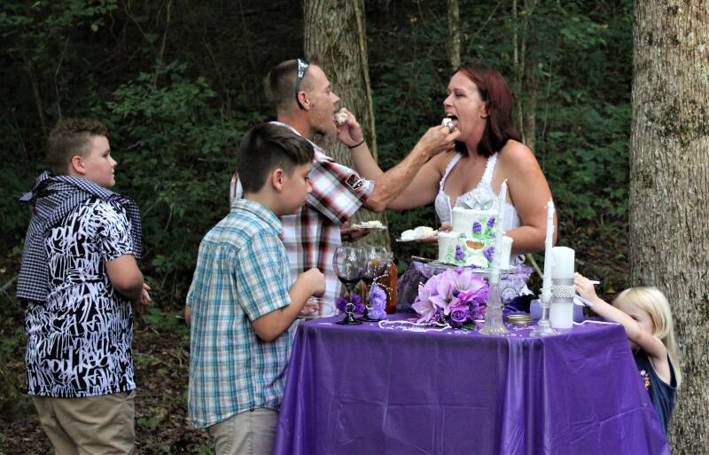biker-wedding-harley-davidson-outdoor-wedding-cake-cutting-ceremony-tammy-brewer-photography-jpeg-standard.jpg