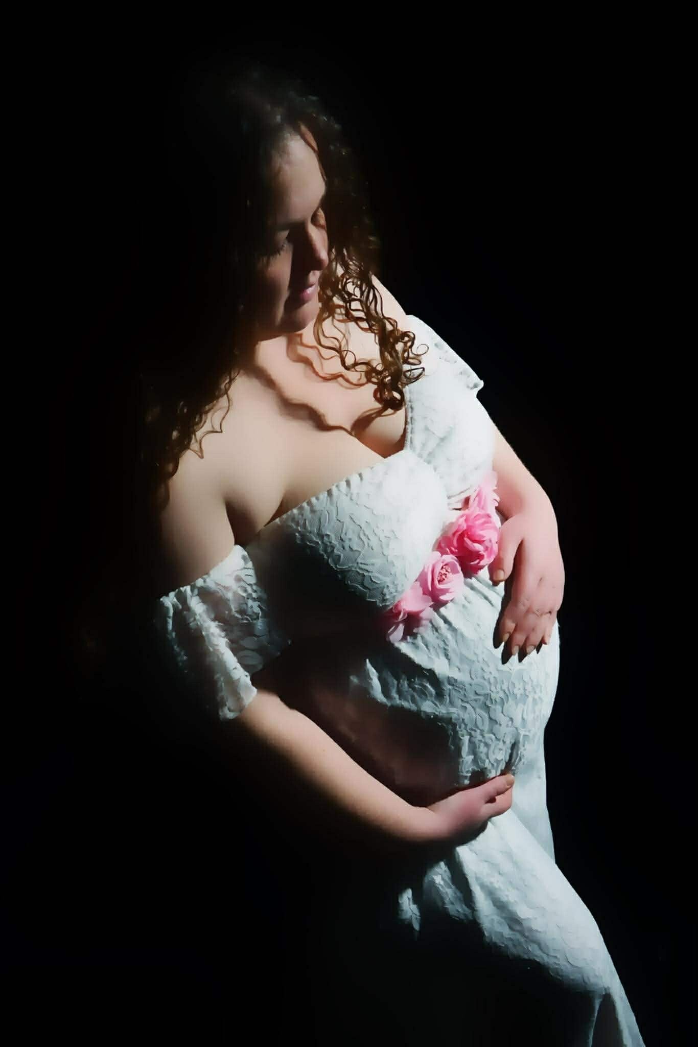 zwangere vrouw met hart 