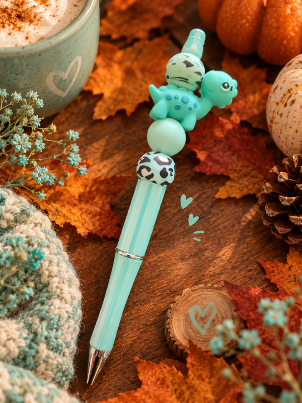 Stylo vert turquoise scintillant dinosaure