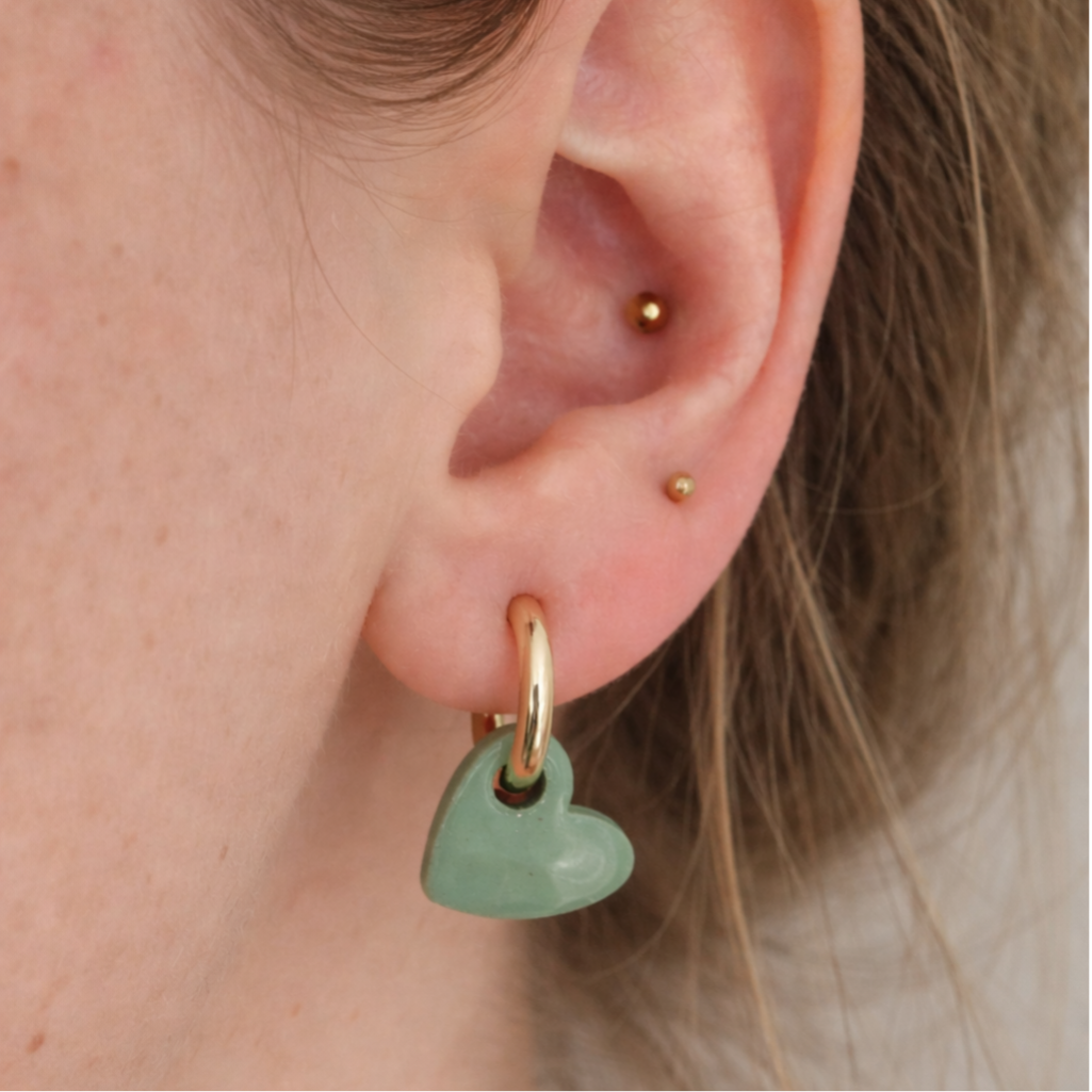 Huggie rond met hartje reversible (verschillende kleuren)