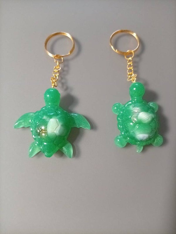 Porte clef honu coquillages phosphorescent