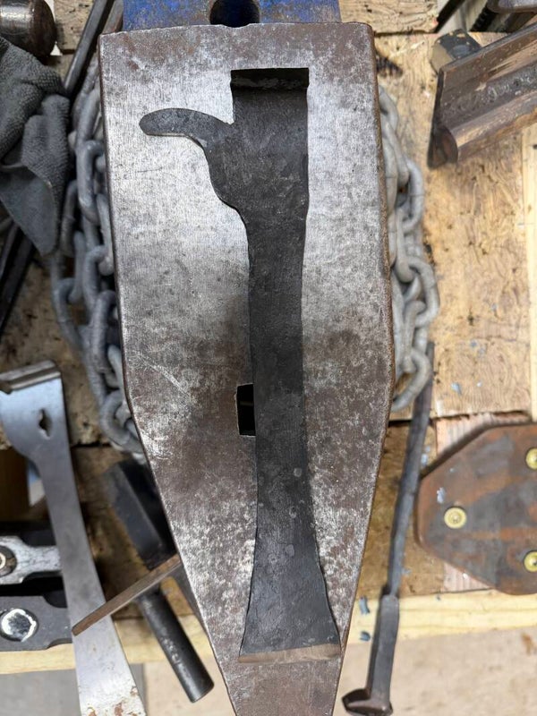Hand forged hive tool.