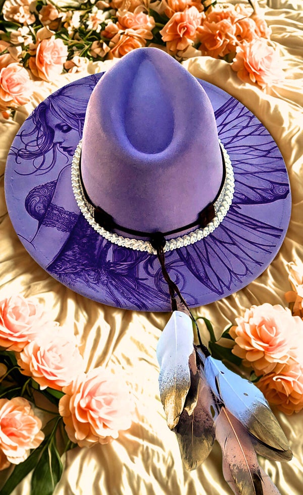 Purple Fairy with gold tipped feathers