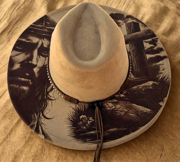 Wide brim hat.  JESUS