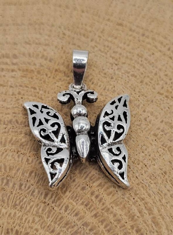 925 zilveren,  hanger bewegende vlinder.