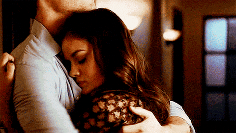 “Romantic couple hugging lovingly on Valentine’s Day.”