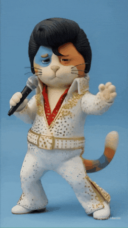 Cartoon Elvis‑style cat performing with a microphone in a fun, dramatic pose.