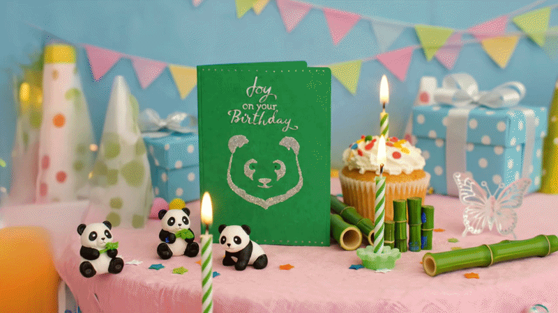 “Handmade kids panda card with warm candle‑light scene”