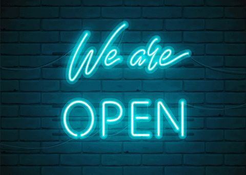 Animated green “OPEN” sign sliding in from the side and facing forward, signalling the shop is open.
