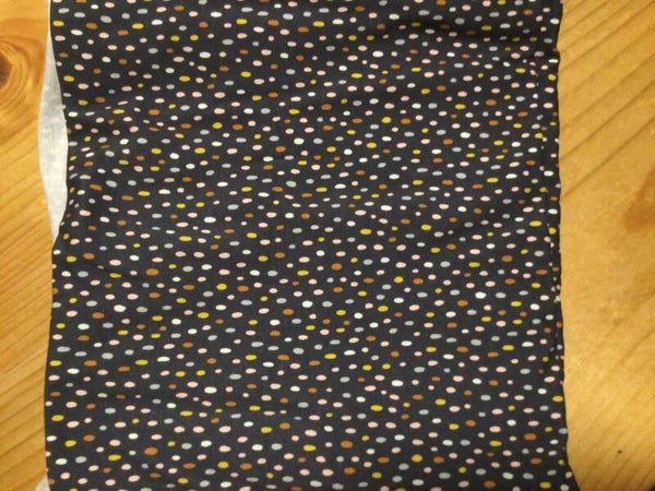 Jersey 120 x 140 cm met bolletjes