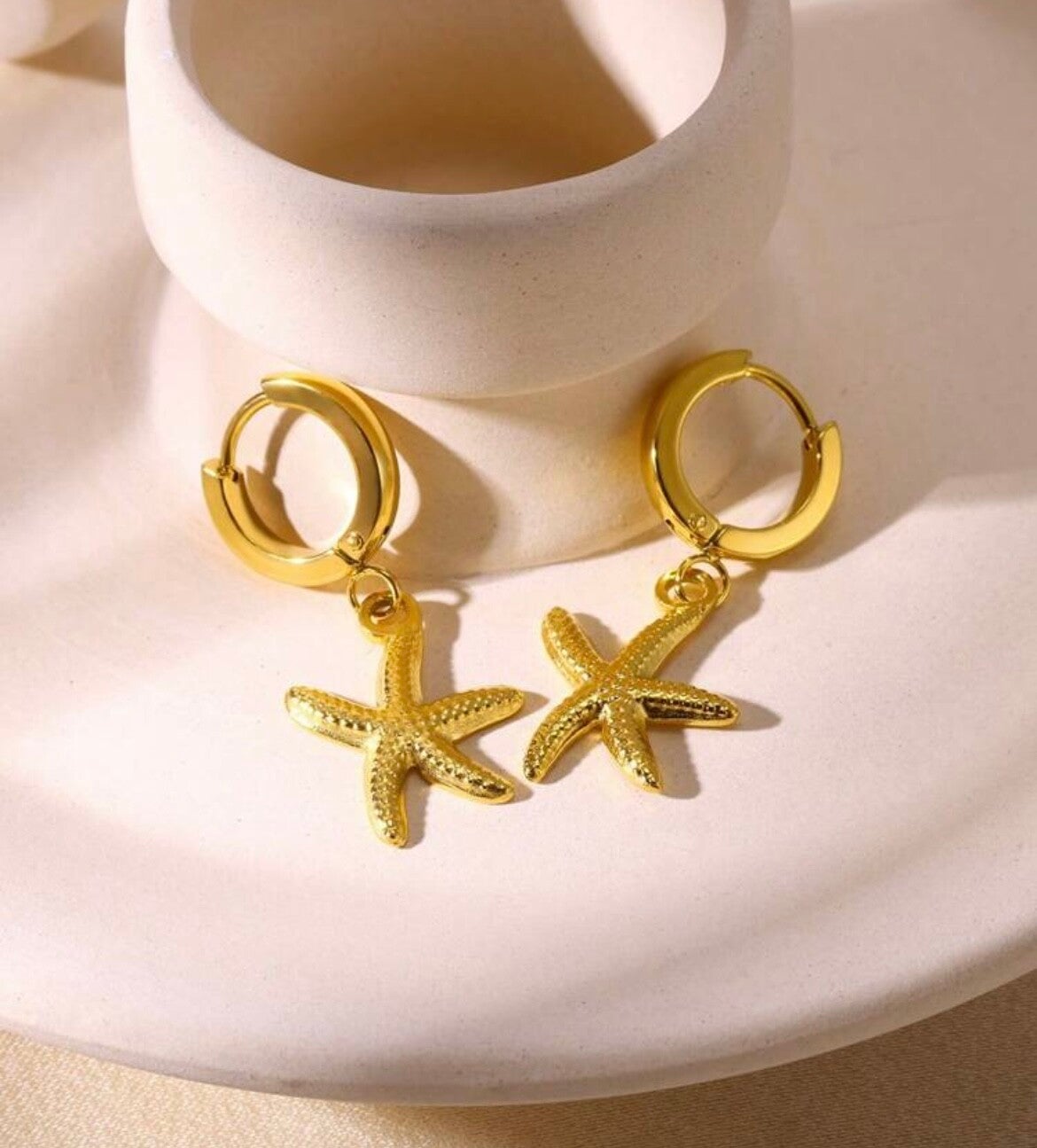 Seastar oorbellen goud