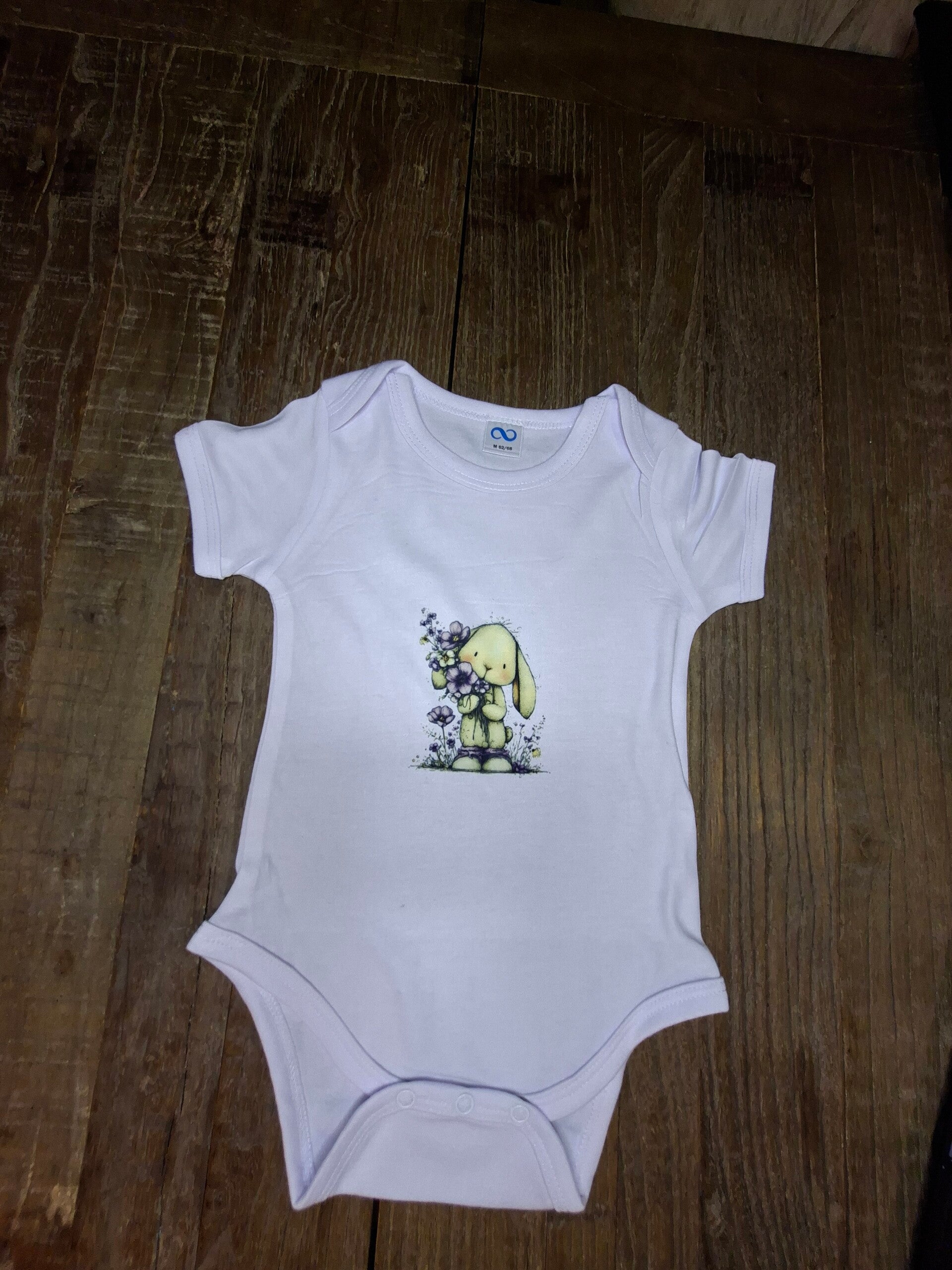 Romper konijn met bloemen