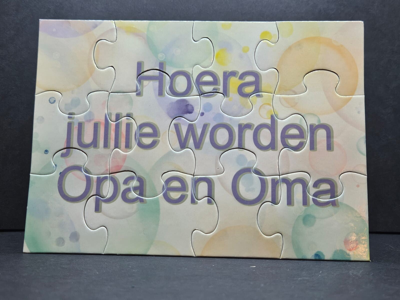 Puzzel van 12 stukjes hoera opa en oma