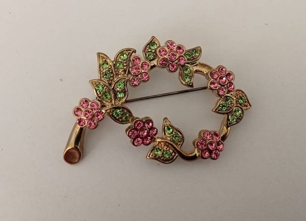 Ovale bloemenkrans met roze en groene stras 10036