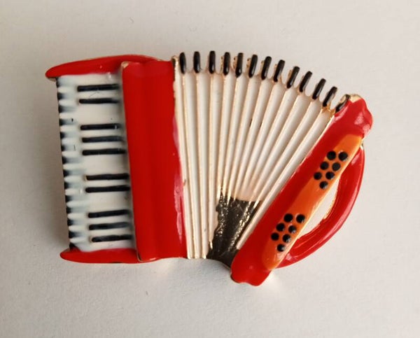 Rode accordeon broche 10058