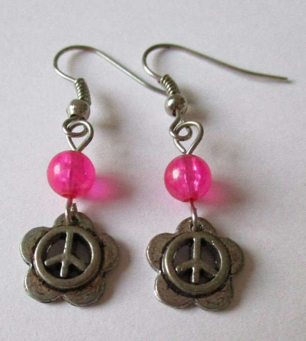 Oorbellen met bloem met peace teken 20222