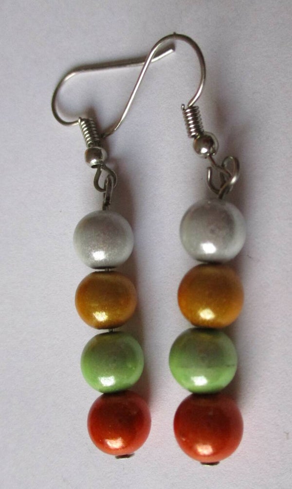 Oorbellen met miracle beads 20243