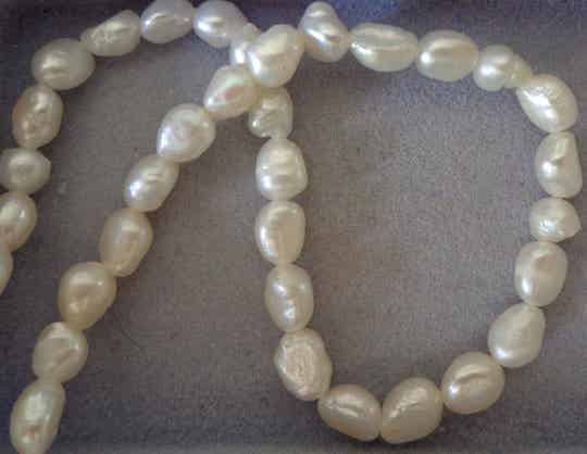 Witte zoetwaterparels  4 - 5 mm kp90305 k3